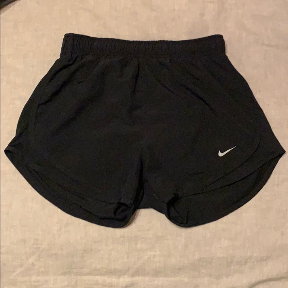 Black Nike running shorts
